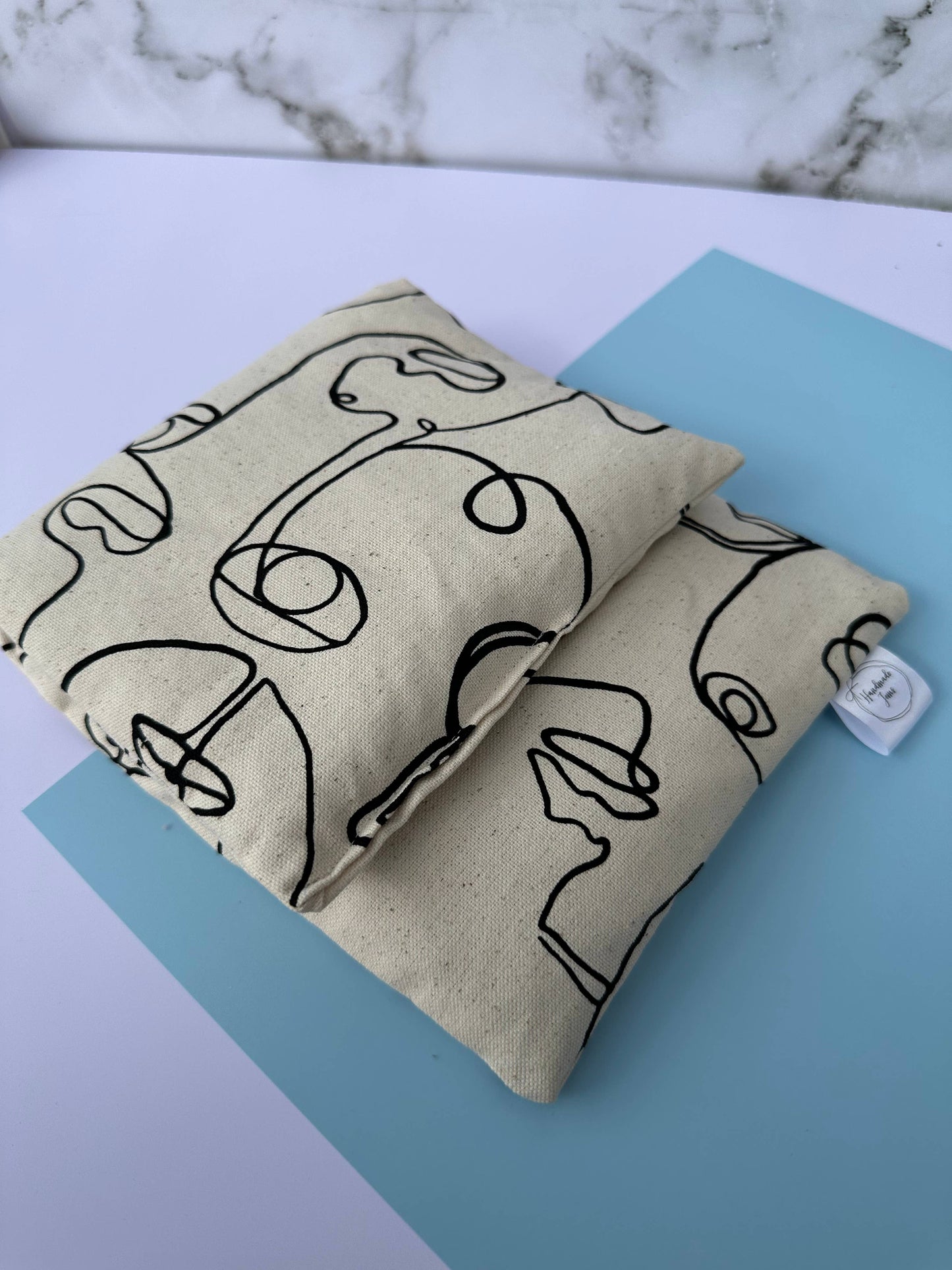 Faces Print Lupin Heat Pack